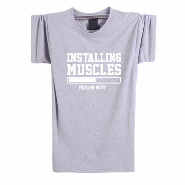 INSTALLING MUSCLES Funny Guy T-Shirt